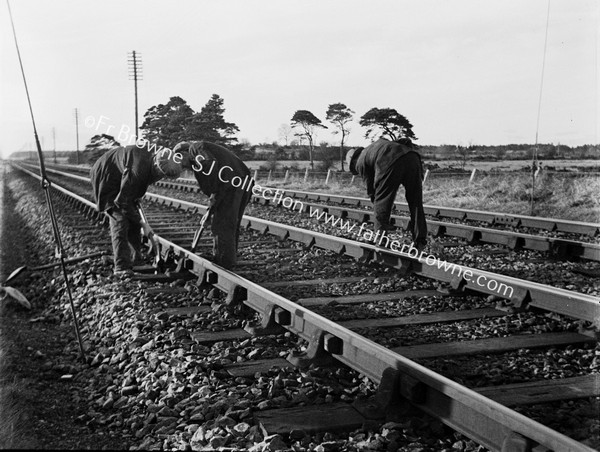 WORKERS ON RAILWAY LINE